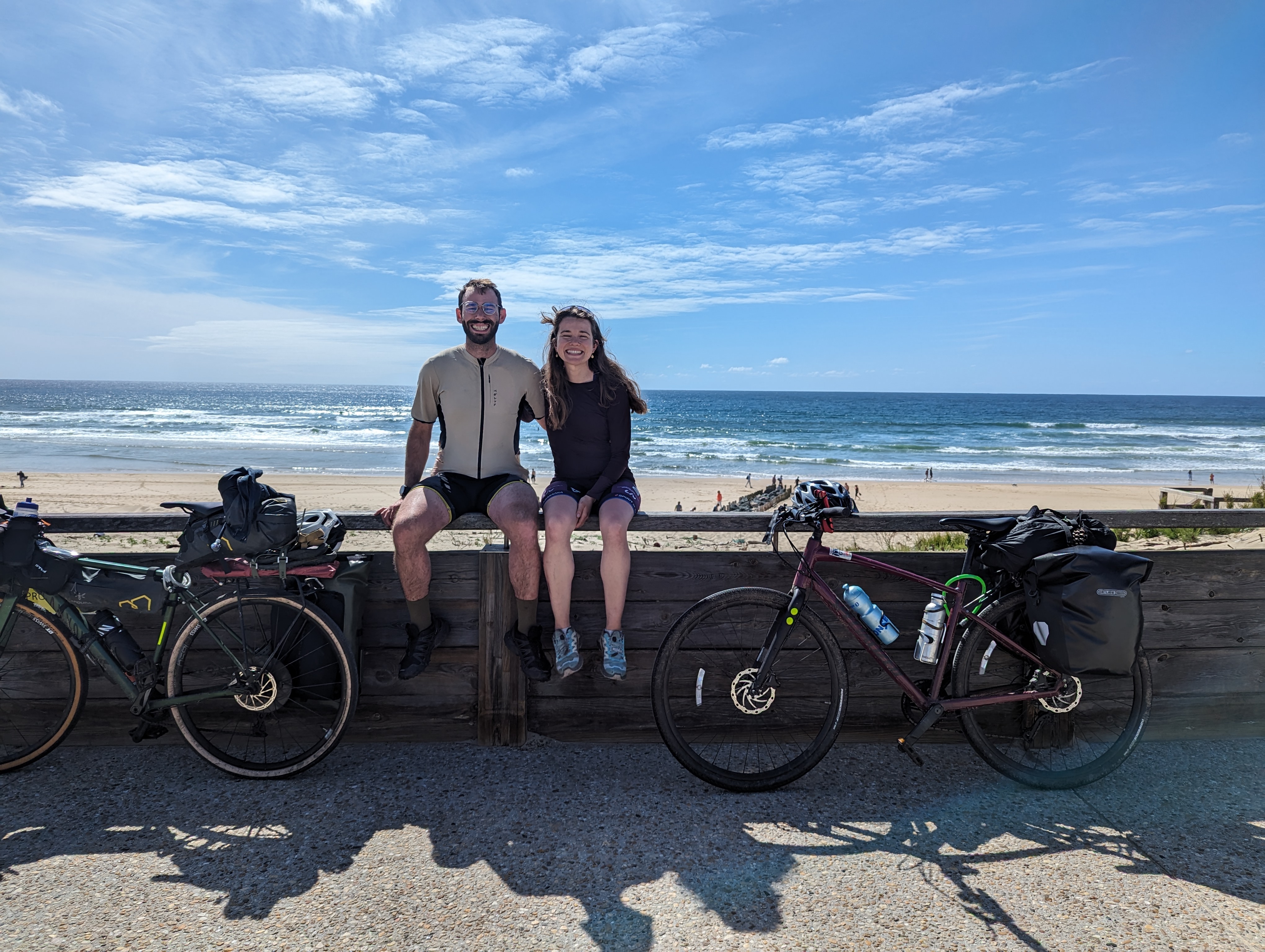 happy bikepackers by the sea